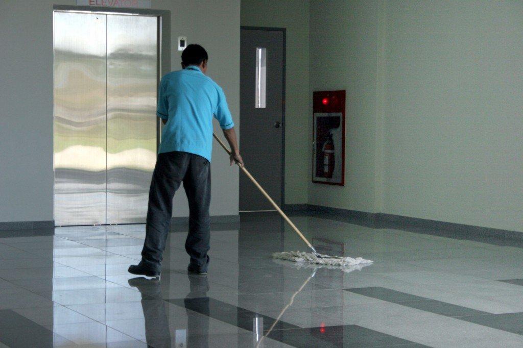 A Man doing building maintenance